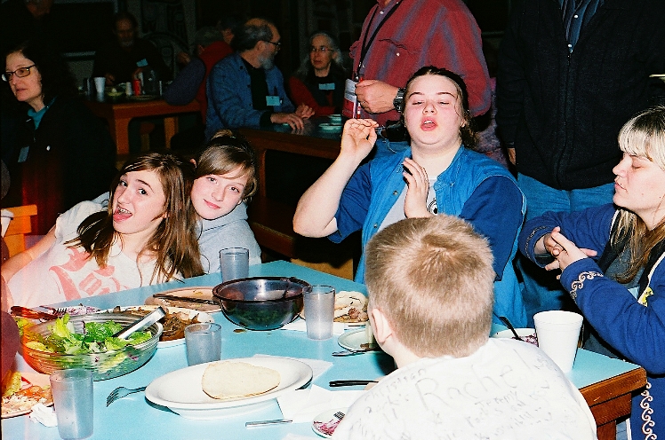 Kids are welcome, but must have a parent or adult that is responsible for them. (This photo is from the a dinner at the old camp. Lake Retreat is much nicer.)